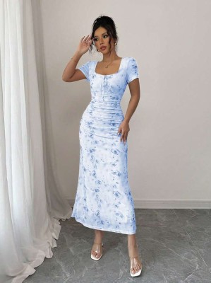 Błękitna sukienka midi wzór (S)