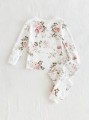 Biała piżama dwuczęściowa wzór (9-12M)