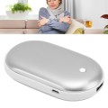 Srebrny ogrzewacz power bank 2w1