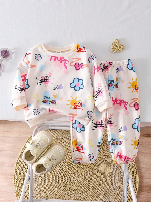 Ecru komplet spodnie bluza wzór (12-18M)