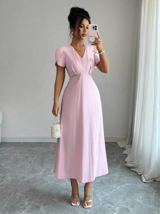 Różowa sukienka midi perły (S)