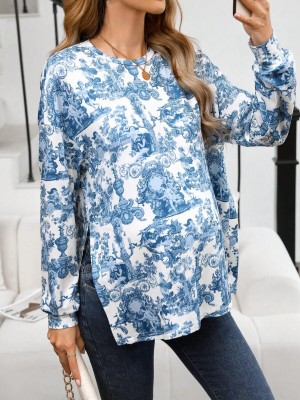 Biała bluzka wzór rozcięcia (XS)