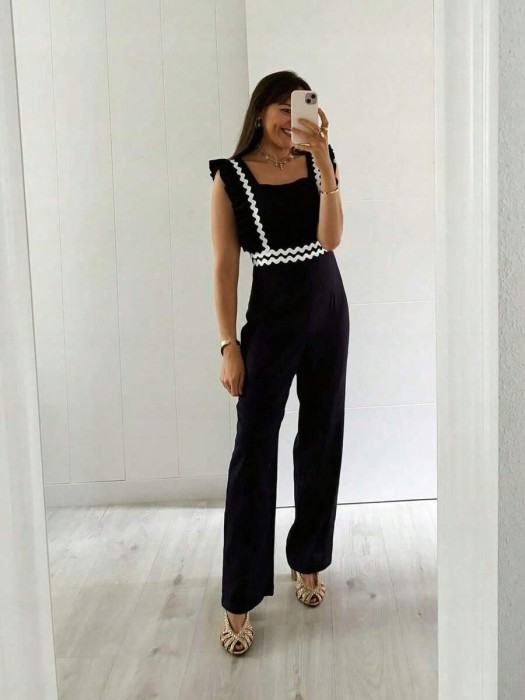 Czarny kombinezon kontrastowe wstawki (XL)