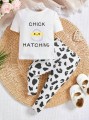 Biały komplet legginsy koszulka wzór (9-12M)