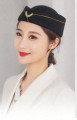 Czarna czapka stewardessy