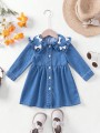 Niebieska jeansowa sukienka (6-9M)