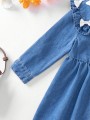 Niebieska jeansowa sukienka (6-9M)