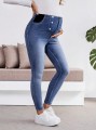 Niebieskie jeansowe rurki high waist (S)