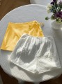 Białe żółte spódnico-spodenki 2pack (L)