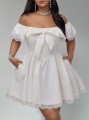 Ecru sukienka mini kokarda (2XL)