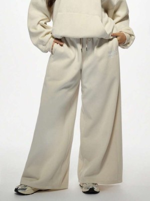 Beżowe proste spodnie hafty (2XL)