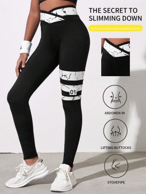 Czarne legginsy wzorzyste wstawki (10L)