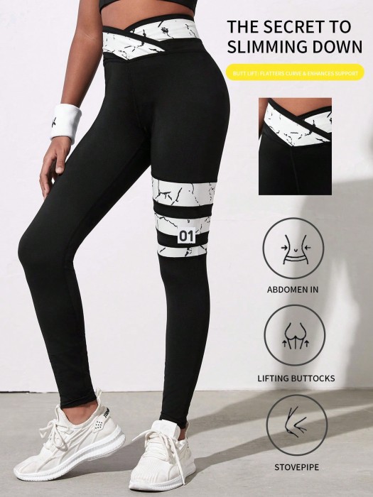 Czarne legginsy wzorzyste wstawki (10L)