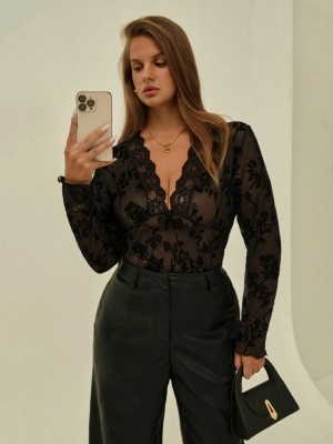 Czarna bluzka długie rękawy wzór (1XL)