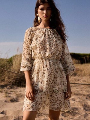 Beżowa sukienka wzór zwierzęcy (M)
