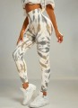 Śmietankowe legginsy tie dye (S)