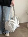 Sportowa torba ecru zamki