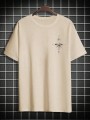 Beżowy t-shirt nadruk (XS)