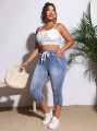 Niebieskie jeansy 3/4 guziki (1XL)