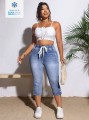 Niebieskie jeansy 3/4 guziki (1XL)